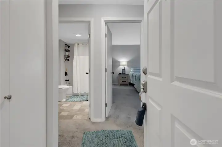 Front door with nice paint and carpet