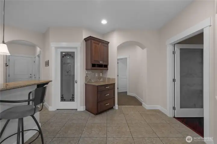 Additional storage and pantry space add convenience just off the kitchen.