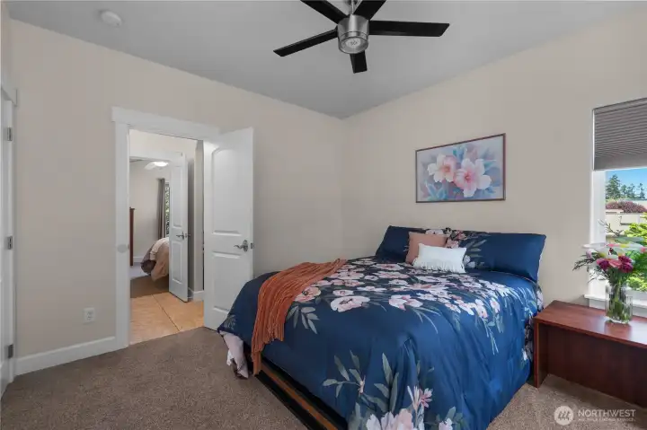 BR 3 - Unwind in a bright bedroom with neutral finishes and a comfortable, functional layout.