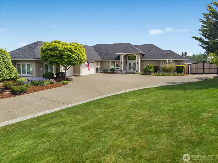 Gated RV parking and wide driveway.