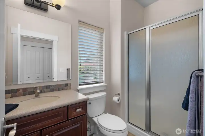 Use the attached 3/4 bath to support office, guest, studio, or MIL-style needs.