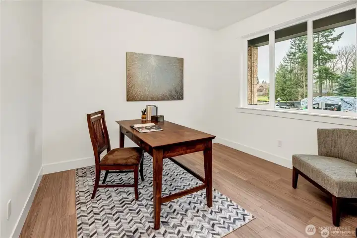 **Photo is from another home in the community with a flipped layout.**