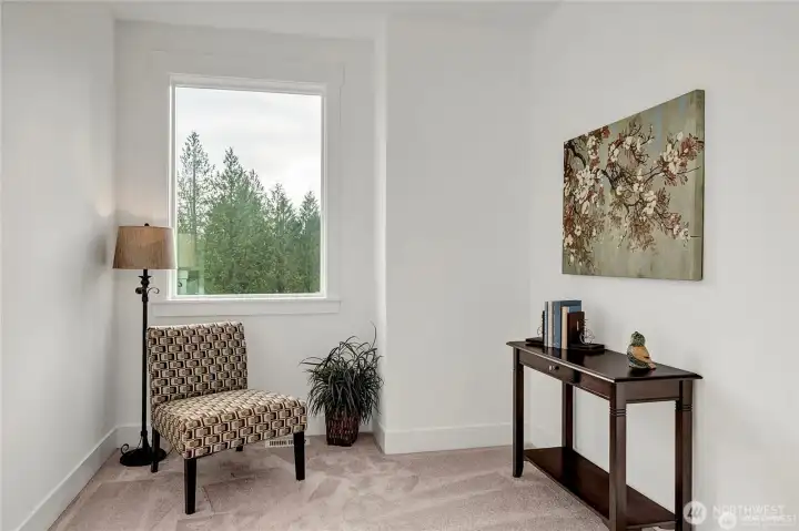 **Photo is from another home in the community with a flipped layout.**
