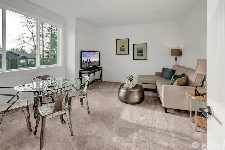 **Photo is from another home in the community with a flipped layout.**