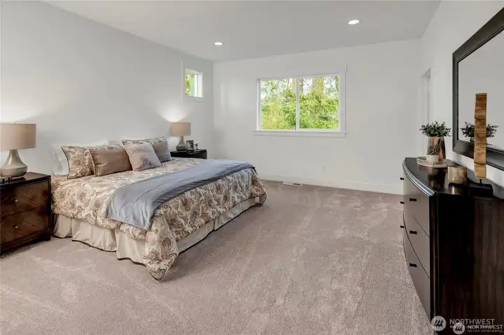 **Photo is from another home in the community with a flipped layout.**