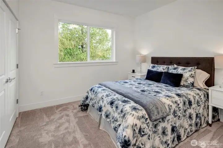**Photo is from another home in the community with a flipped layout.**