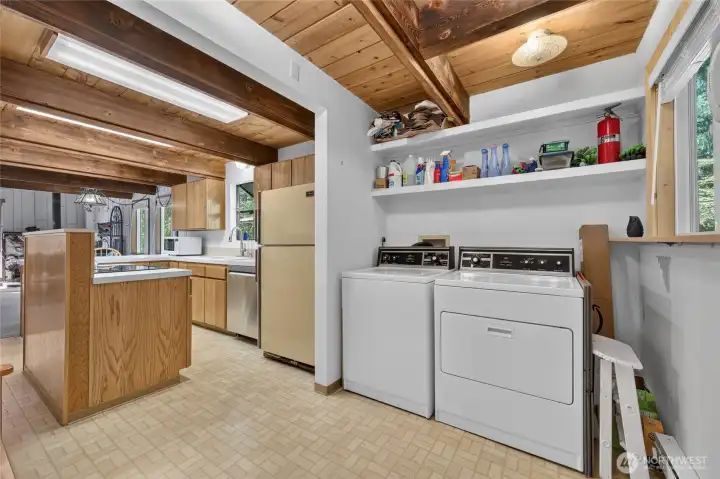 Laundry room conveniently located near the garage entry for everyday functionality. Laundry room conveniently located near the garage entry for everyday functionality.