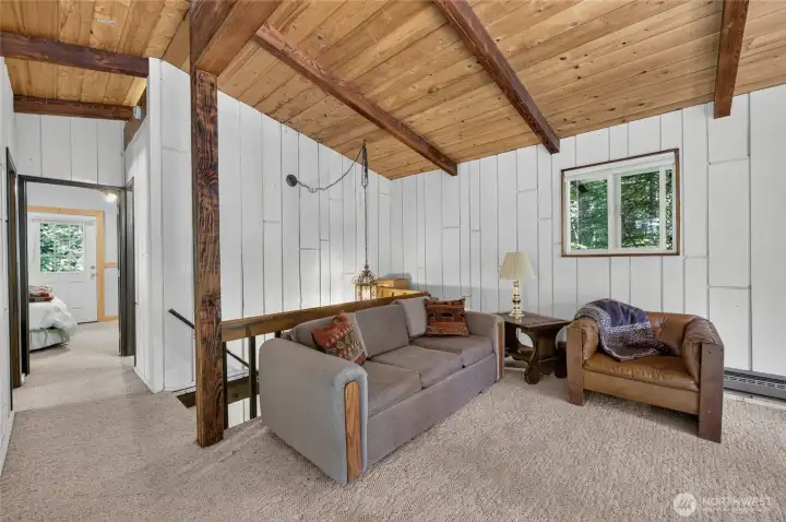 Loft overlooking the great room, providing flexible living or recreation space. Loft overlooking the great room, providing flexible living or recreation space.