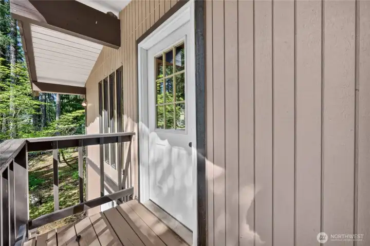 Exterior access from the upper level to a private balcony. Exterior access from the upper level to a private balcony.