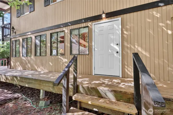 Rear entry providing convenient access to the backyard and outdoor living areas. Rear entry providing convenient access to the backyard and outdoor living areas.