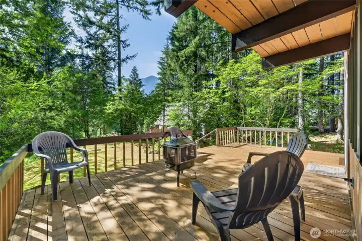 Covered rear deck designed for outdoor dining and relaxing. Covered rear deck designed for outdoor dining and relaxing.
