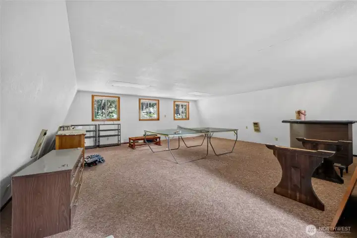 Finished bonus room providing additional conditioned living space. Finished bonus room providing additional conditioned living space.