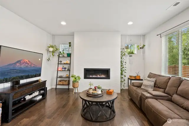 Plenty of natural light and a cozy gas fireplace...it's the perfect room.