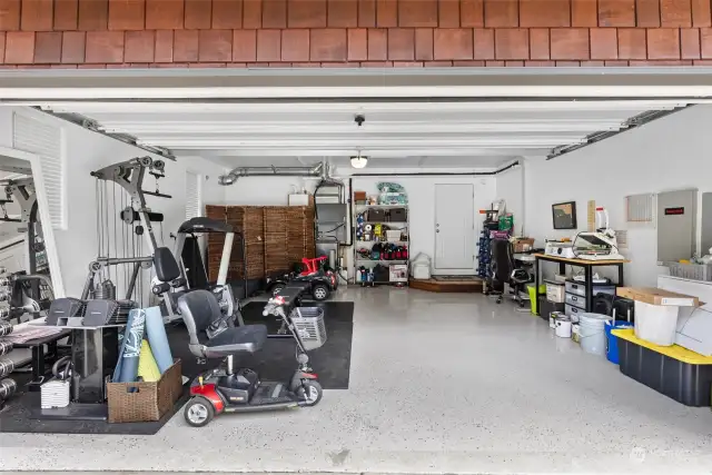 Two car attached garage. Half of the garage is currently being used as a gym and equipment can stay.