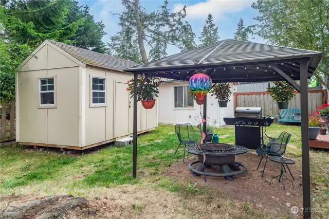 Two large sheds for lawn equipment, storage or sporting goods.