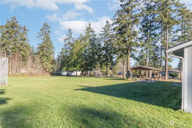 There is a covered picnic area to the right.