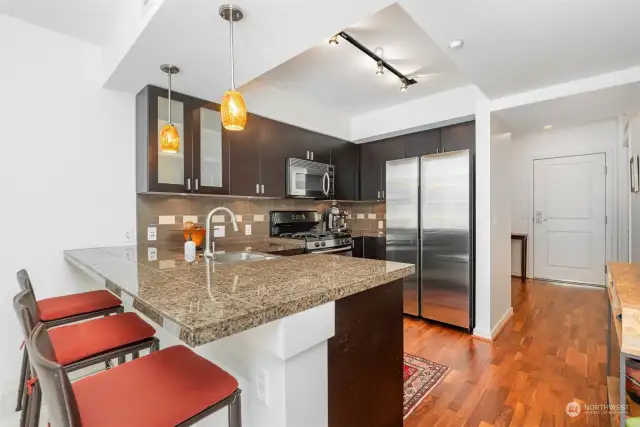 Countertop bar for socializing and casual dining.