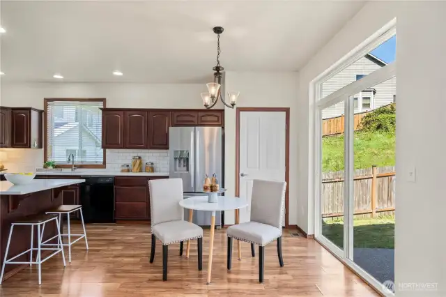 Kitchen nook overlooks private yard