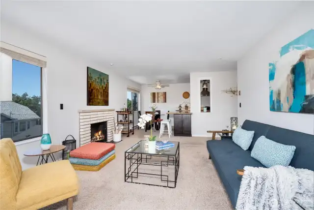 Warm and cozy carpeting and wood-burning fireplace.