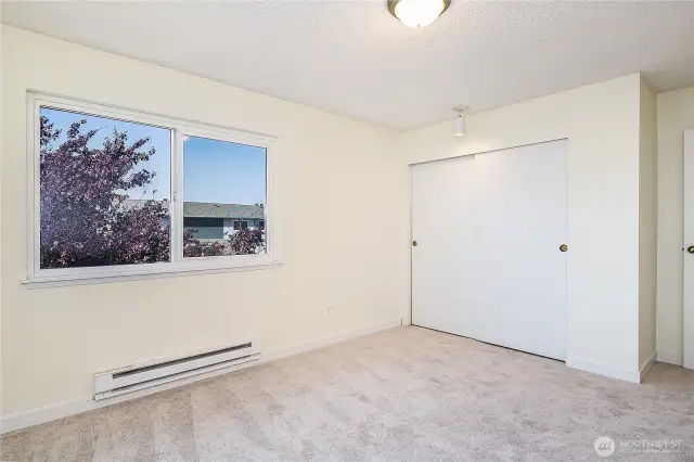 Second bedroom with west facing windows and large closet.