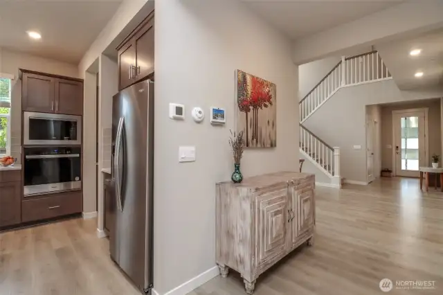 Smart panel off the kitchen. Control home security system and remote control of lights.