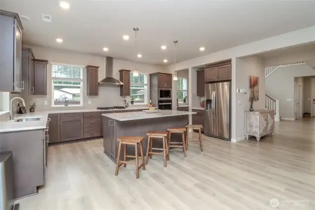 Open layout kitchen with extra window for light.