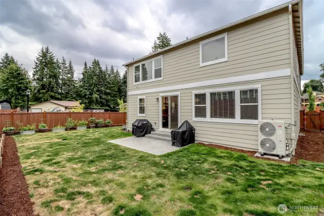 Large level fully fenced backyard.