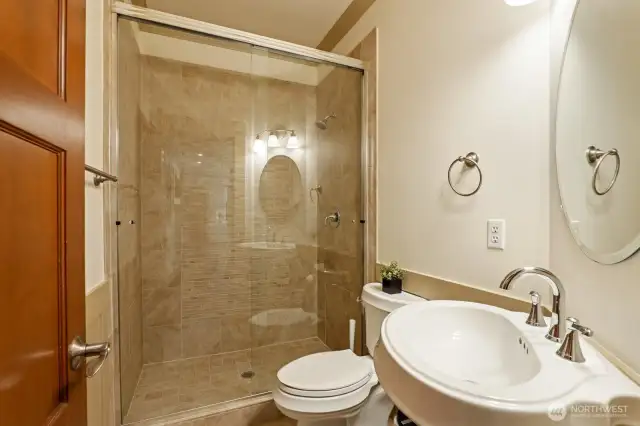 Main floor 3/4 bath adjacent to bedroom.