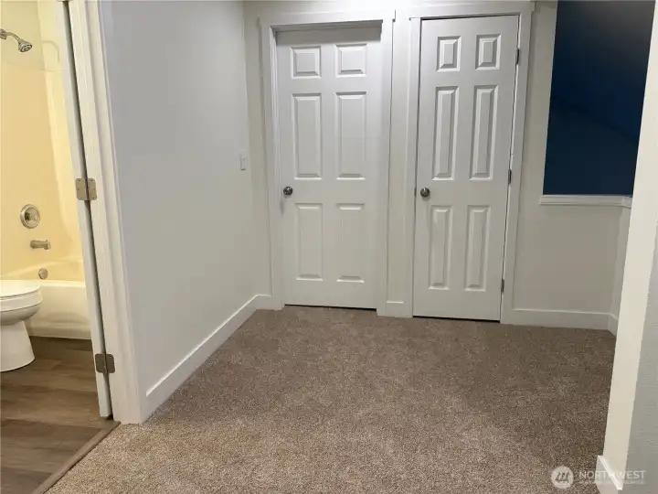 Second floor hallway to bedrooms and both second full baths