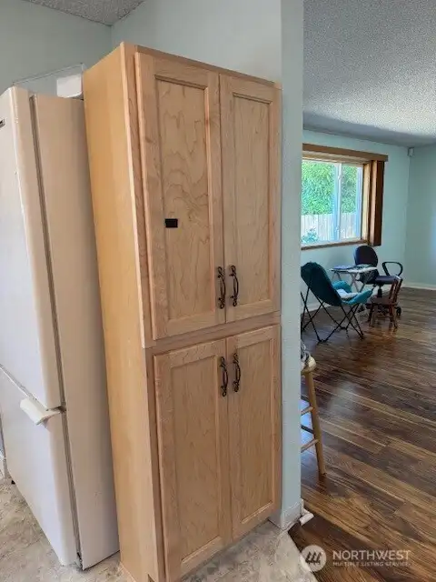 Even another cabinet for more storage before you go back into the living room