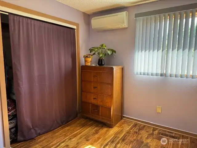 The second bedroom is very roomy too! and the laminate flooring is in both bedrooms and hallway.