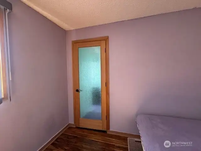 This door from the 2nd bedroom leads to the laundry room and wait for the surprise.