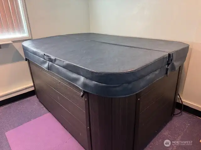 The surprise!  A hot tub! Bromine chemicals are used for sanitizer.