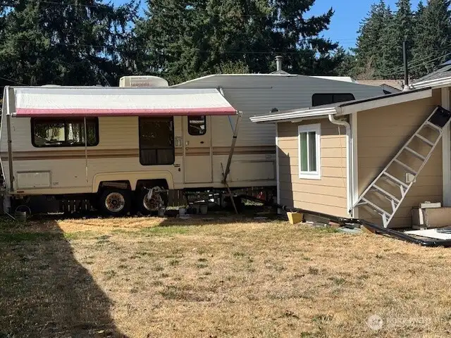 Yup! You have room for a RV in the back yard and there is a waste dump. Or you might have a boat or other things to have back here.