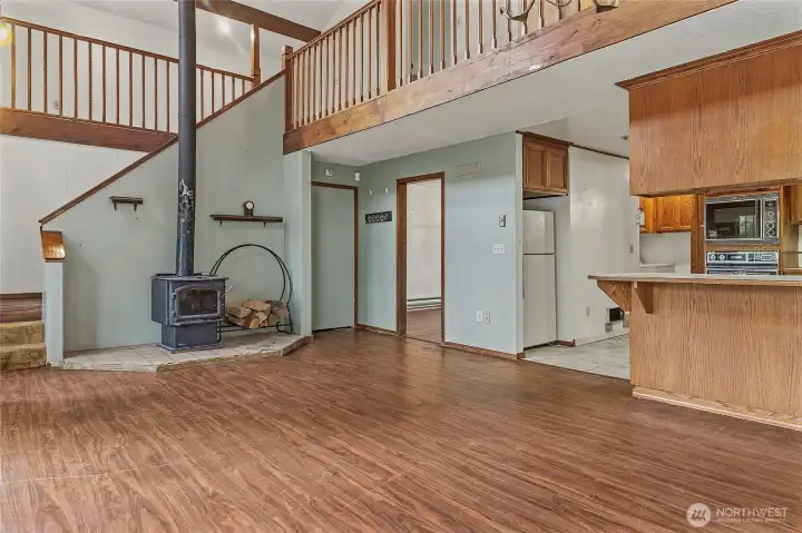 Cozy wood stove--kitchen on the right