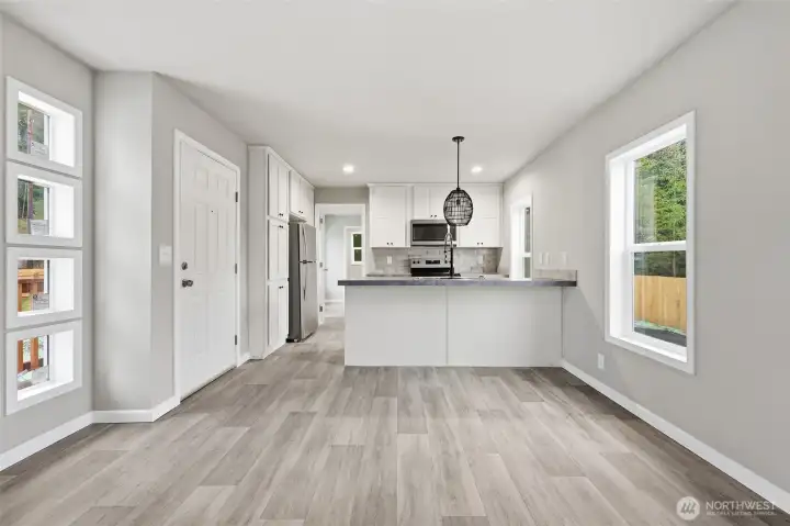 Down the hall is the primary bedroom. This is looking from the main living area.