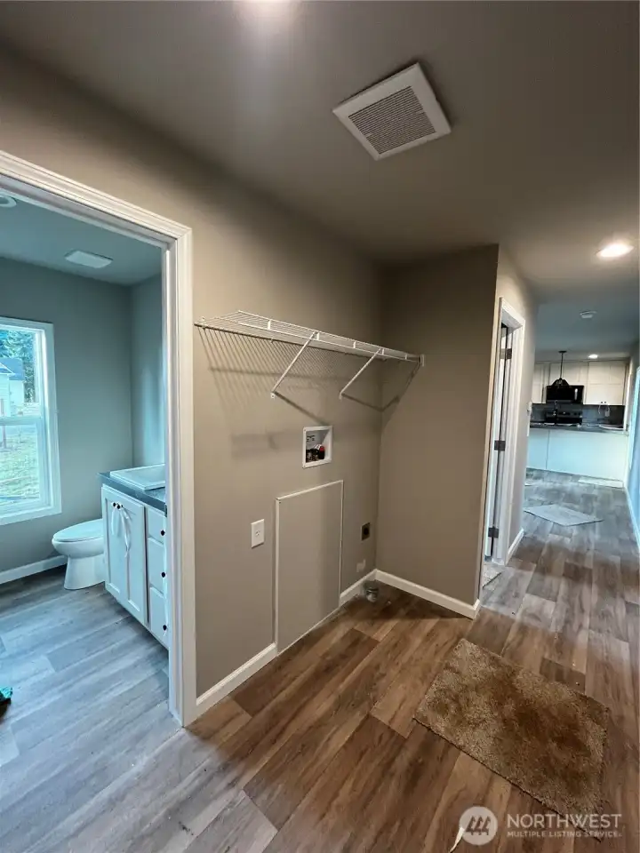 Utility space right off back door entrance.