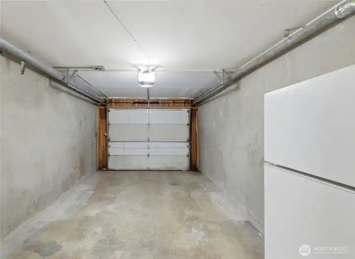 Your own garage! Ample parking w/ 5 guest/owner dedicated spots