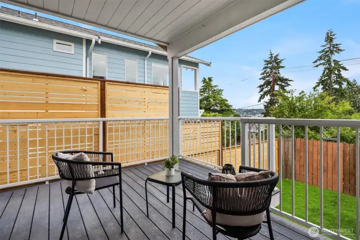 Private Covered Deck, View of the Olympics, Sunsets, Ballard treeline and tip of Ballard Bridge Private Covered Deck, View of the Olympics, Sunsets, Ballard treeline and tip of Ballard Bridge