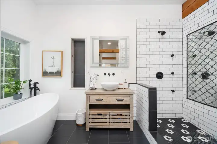 Ample walk-in shower and a soak in tub