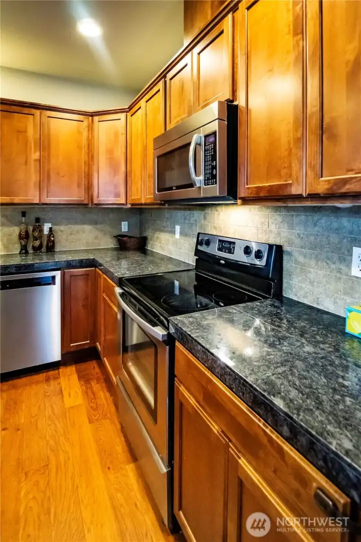 PLENTY OF COUNTER SPACE...GRANITE TILE COUNTERS