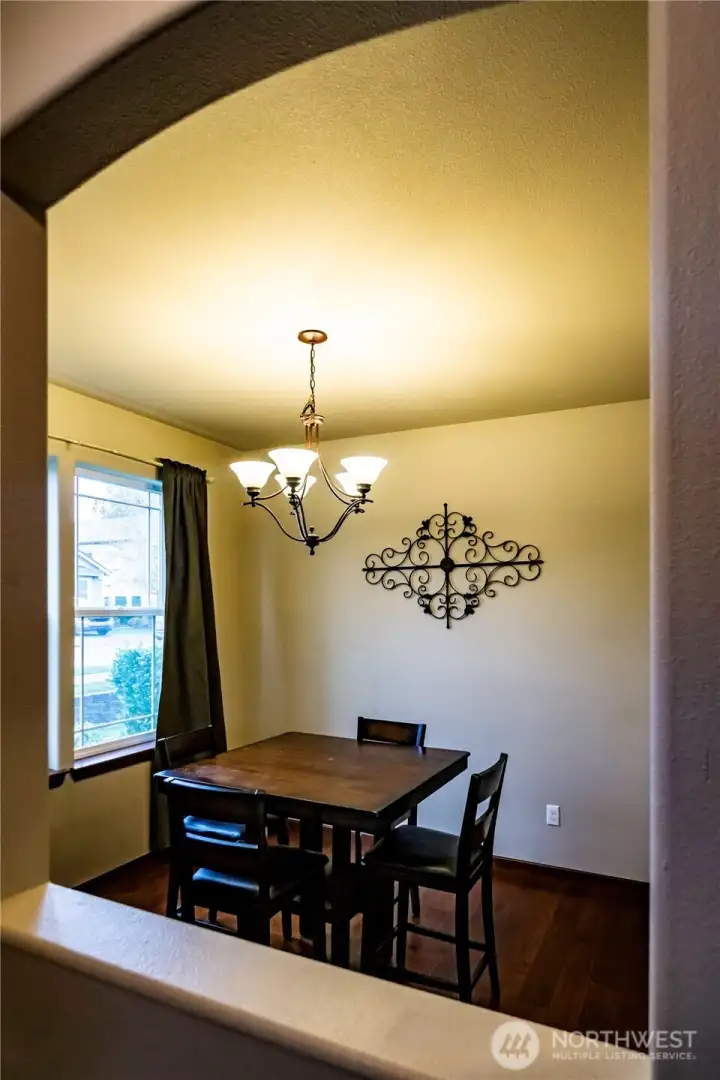 LOVELY DINING AREA WITH PLENTY OF LIGHT...