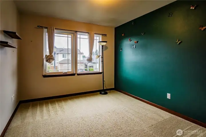 SECONDARY BEDROOM UPSTAIRS...WITH WALK IN CLOSET