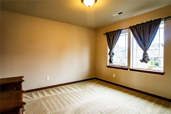 OTHER SECONDARY BEDROOM UPSTAIRS...NICELY SIZED ROOM WITH WALK IN CLOSET AS WELL