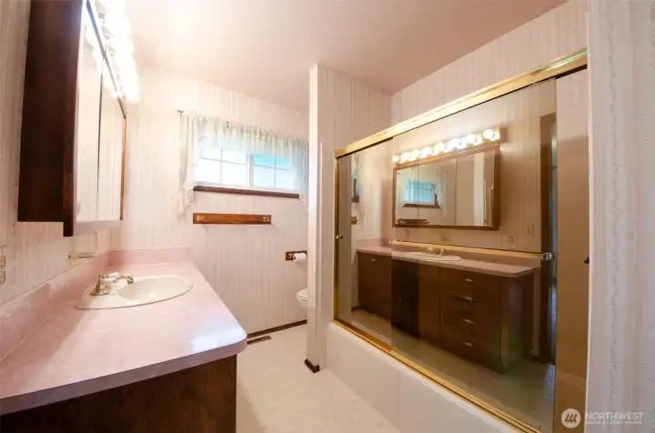 Main Bathroom connected to both bedroom and hallway