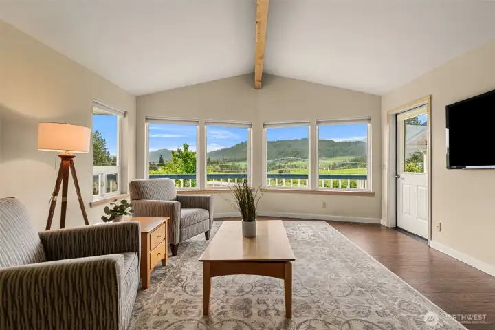 where expansive windows capture sweeping mountain and valley views.
