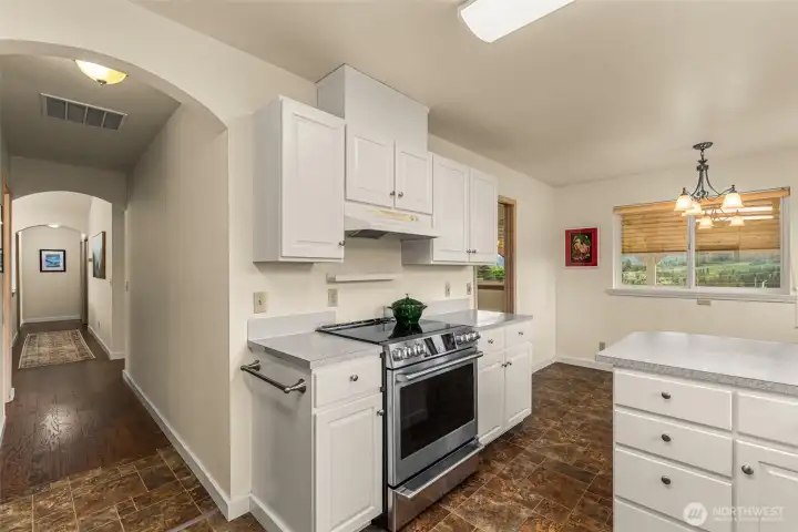 Thoughtfully positioned windows bring in natural light and surrounding territorial views.