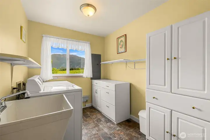 Large laundry with storage and utility sink