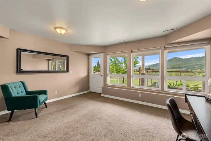 he generous layout offers flexibility for a media room, home office, guest retreat, or secondary living area, while direct exterior access creates seamless indoor-outdoor flow.