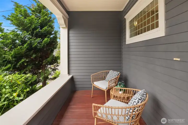 Inviting front porch with views to a beautiful street Inviting front porch with views to a beautiful street